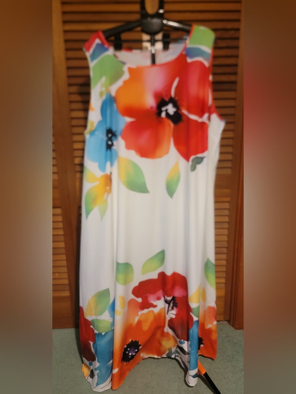 Sleeveless White Floral Maxi Dress with Bold Red & Blue Blooms